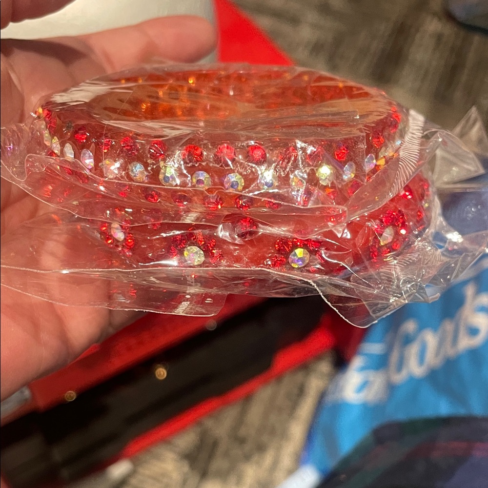 Two red acrylic rhinestone bracelets